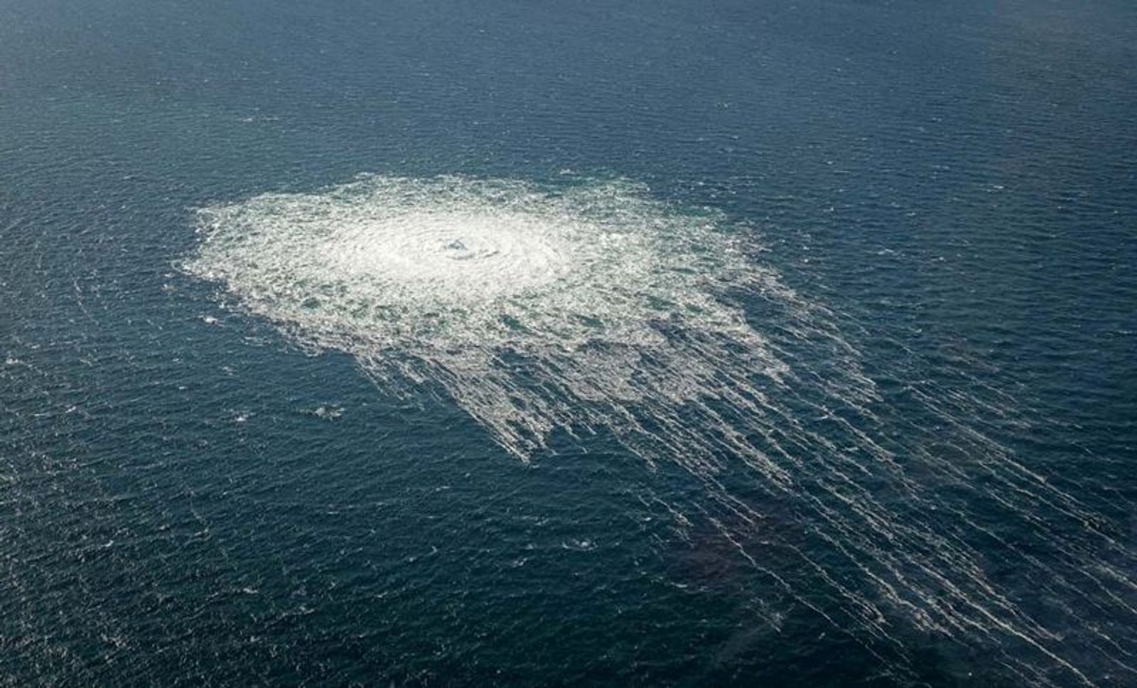 FILE PHOTO: Gas bubbles from the Nord Stream 2 leak reaching surface of the Baltic Sea in the area shows disturbance of well over one kilometre diameter near Bornholm, Denmark, September 27, 2022.  Danish Defence Command/Handout via REUTERS/File Photo