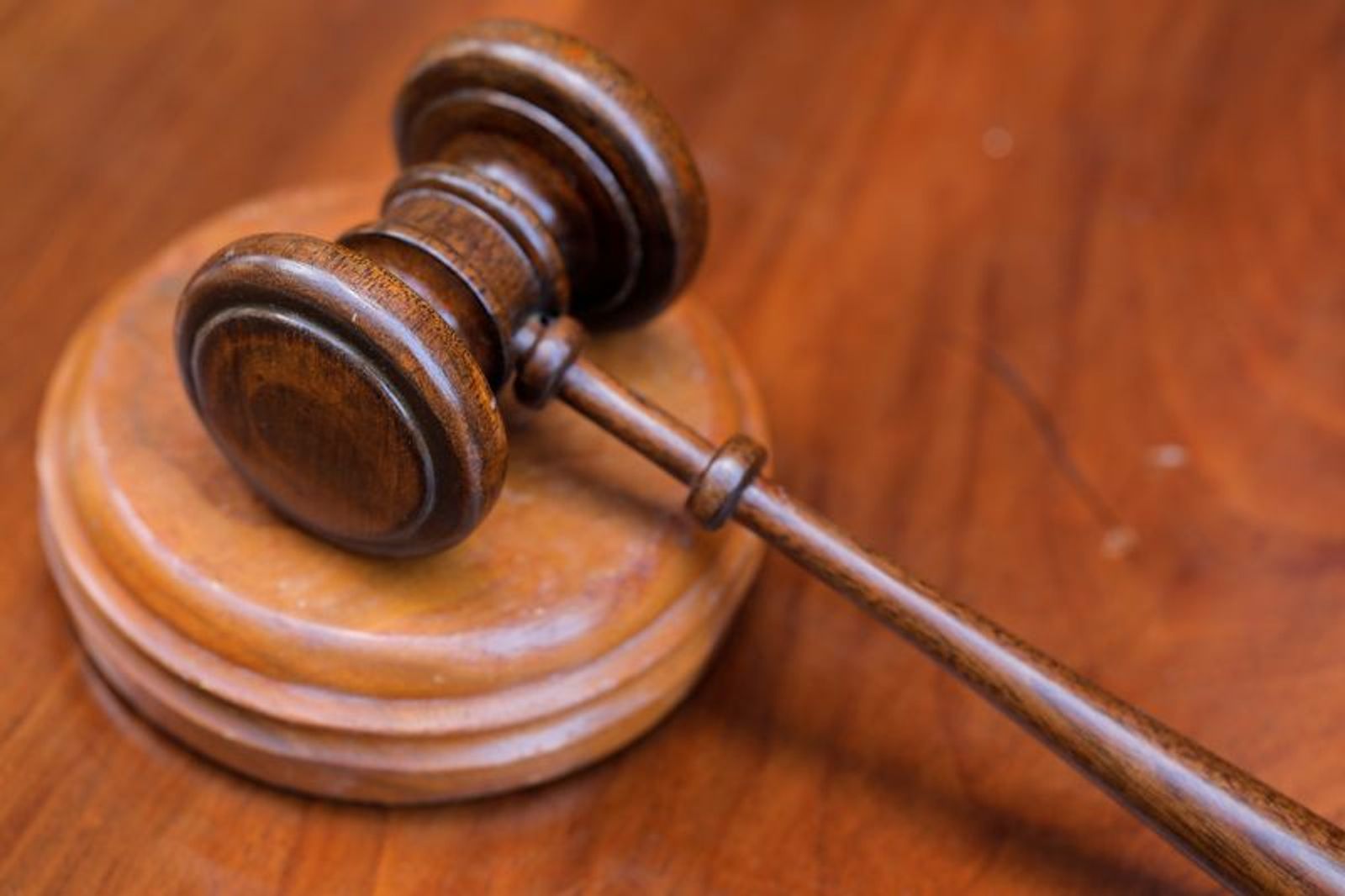 FILE PHOTO: A gavel and a block is pictured in this illustration picture taken in Manhattan, New York City, U.S., August 18, 2020. REUTERS/Andrew Kelly/Illustration/File Photo