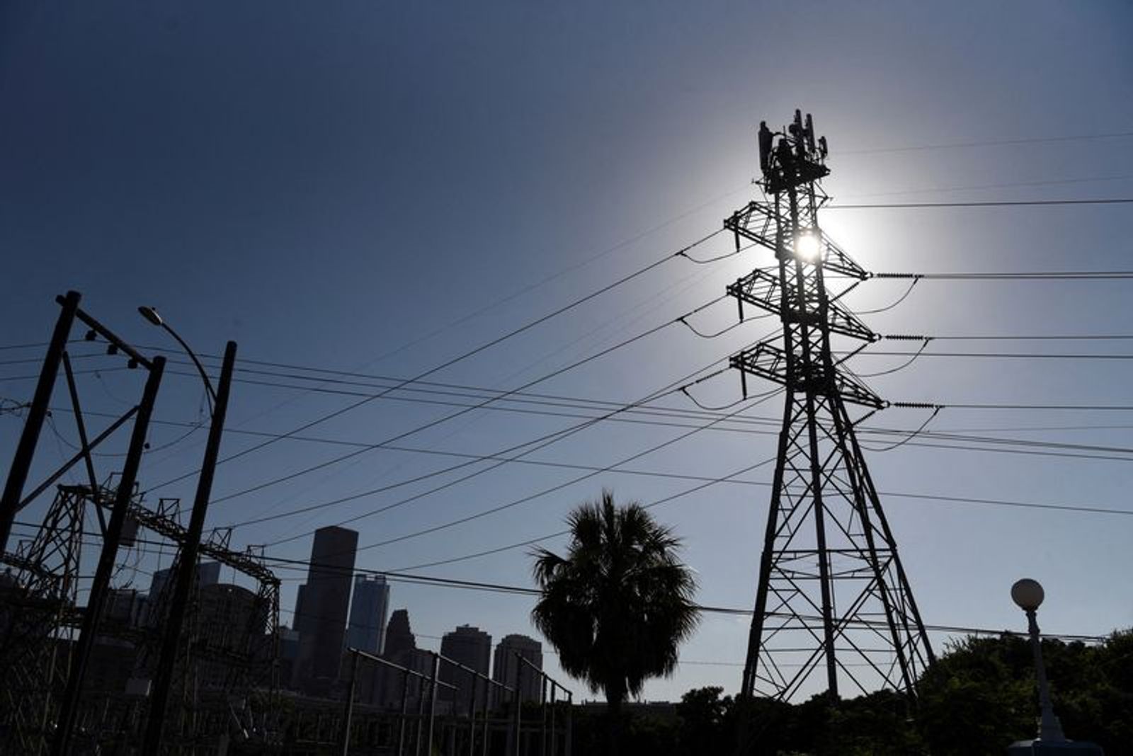 FILE PHOTO: A general view of electric lines as demand for power surged during a period of hot weather in Houston, Texas, U.S. June 27, 2023. REUTERS/Callaghan O?Hare/File Photo